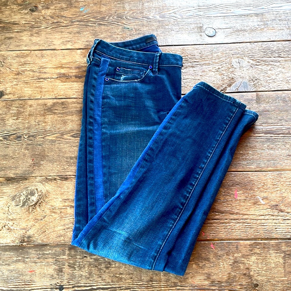 Blue denim pin stripes down the sides, contain 2% Lycra for stretch.